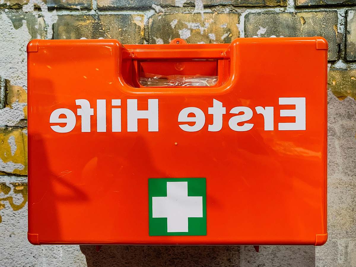 first aid red box close-up photography orange